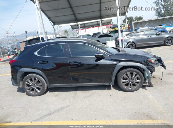 JTHY3JBH5K2004876 2019 LEXUS UX 200 Black Vista interior trasera