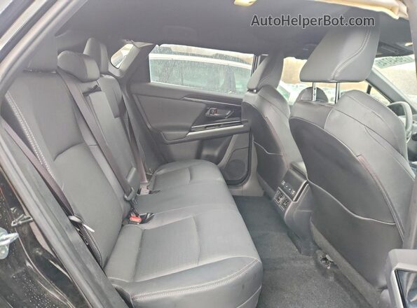 JTMABABA0RA057137 2024 SUBARU SOLTERRA Черный Вид задней части салона