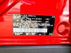 2026 Toyota Bz Xle Burgundy vin: JTMBFAEB8TA004531