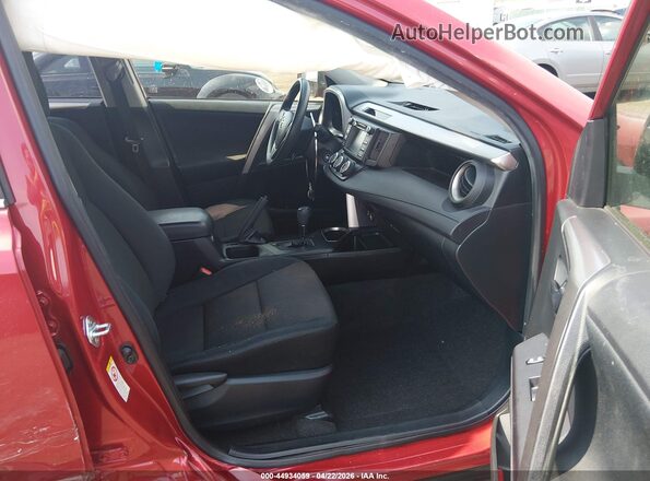 JTMBFREV6GJ090372 2016 TOYOTA LE Red Widok wnętrza z przodu