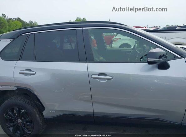 JTME6RFV4PD542572 2023 TOYOTA RAV4 HYBRID Серебряный Вид задней части салона