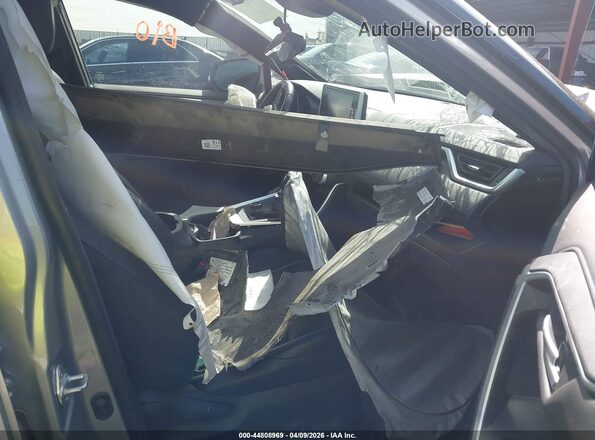 JTMEWRFVXKD517555 2019 TOYOTA RAV4 HYBRID Silver Widok wnętrza z przodu