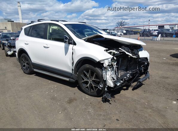 JTMJFREV0GJ070971 2016 TOYOTA RAV4 White Front right