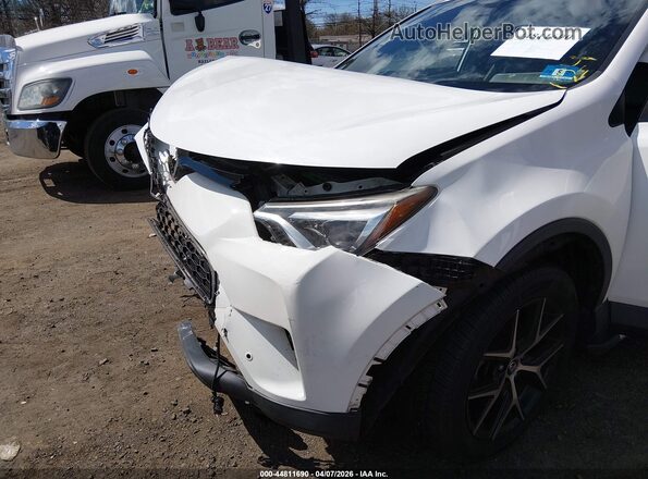 JTMJFREV0GJ070971 2016 TOYOTA RAV4 White Front view