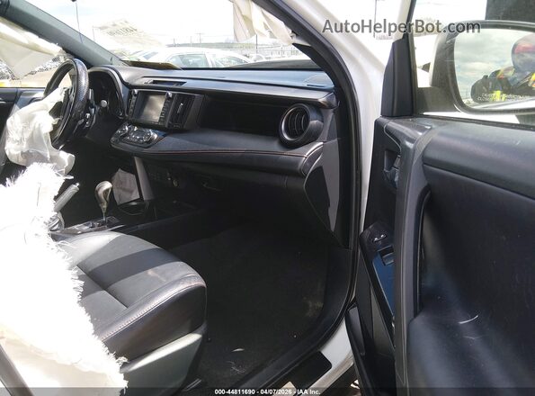 JTMJFREV0GJ070971 2016 TOYOTA RAV4 White Front interior view