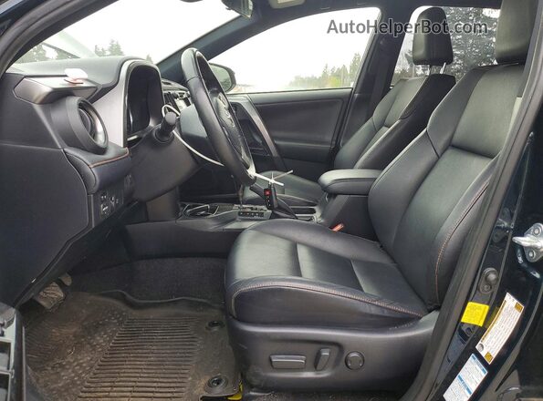 JTMJJREV7JD217582 2018 TOYOTA RAV4 Blue Vista interior delantera