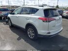 2018 Toyota Rav4 Limited White vin: JTMYFREV4JD115009