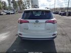 2018 Toyota Rav4 Limited White vin: JTMYFREV4JD115009