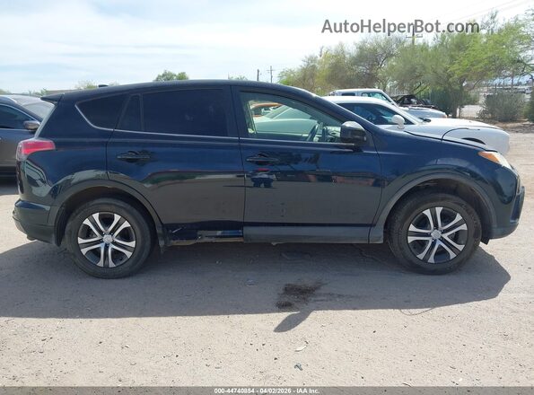 JTMZFREV0JJ164150 2018 TOYOTA LE Blue Vista interior trasera