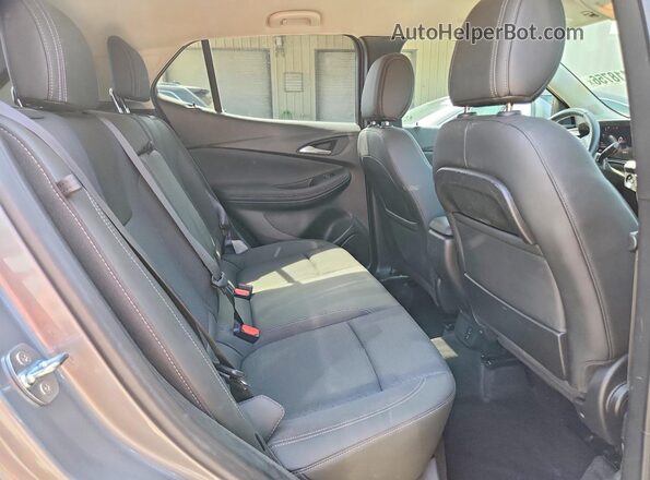 KL4AMCSL2RB001325 2024 BUICK ENCORE Серебряный Вид задней части салона