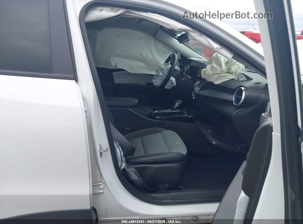 KL77LHEP2SC239042 2025 CHEVROLET TRAX White Vista interior delantera