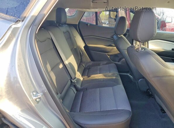 KL77LHEP5SC191164 2025 CHEVROLET TRAX Серебряный Вид задней части салона