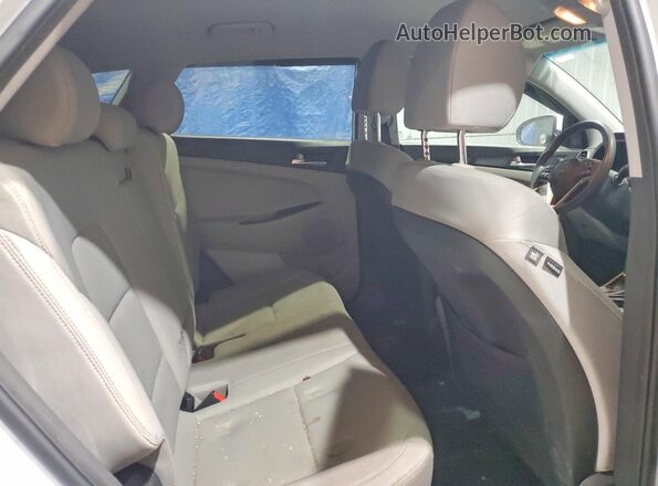 KM8J3CA44KU073071 2019 HYUNDAI TUCSON Black Vista interior trasera
