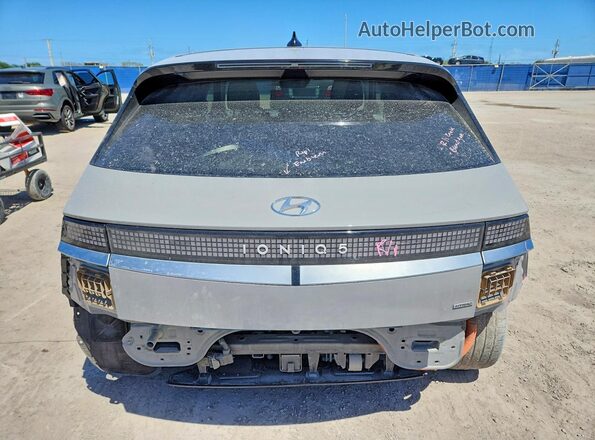 KM8KRDAF7NU065190 2022 HYUNDAI IONIQ Серебряный Вид сзади