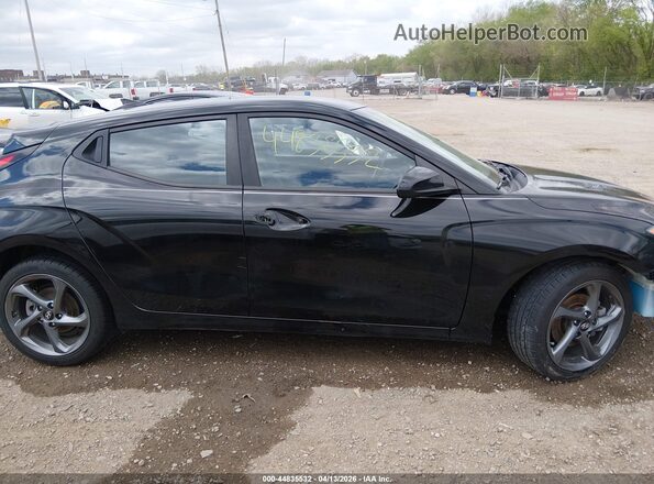 KMHTG6AF3KU015601 2019 HYUNDAI VELOSTER Black Vista interior trasera