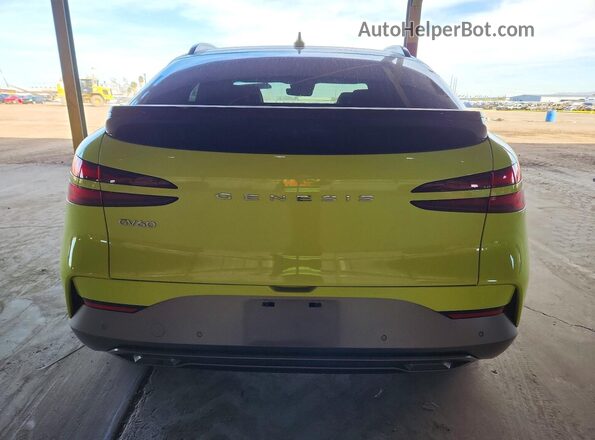 KMUKCDTC4PU014612 2023 GENESIS GV60 Yellow Rear view