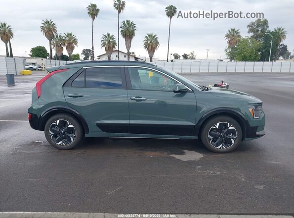 KNDCT3L19R5101774 2024 KIA NIRO EV Green Rear interior view