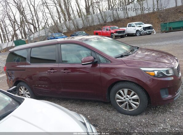 KNDMB5C1XH6333330 2017 KIA SEDONA Бордовый Вид задней части салона
