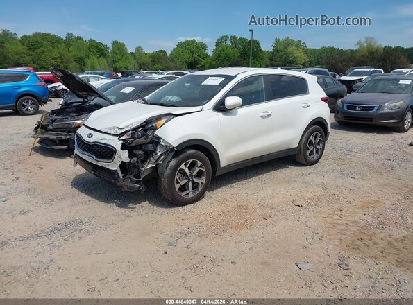 KNDPM3ACXM7930384 2021 KIA SPORTAGE White Vista tres cuartos delantera izquierda