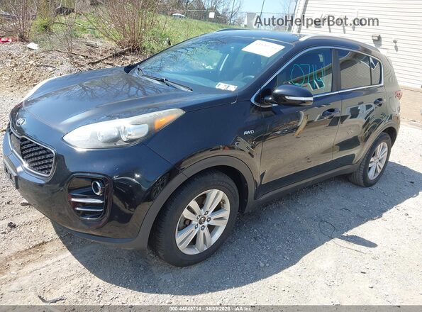 KNDPMCAC3J7306325 2018 KIA SPORTAGE Черный Передняя левая четверть