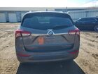 2019 Buick Envision Essence Желто-коричневый vin: LRBFX2SAXKD091540