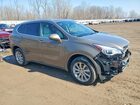2019 Buick Envision Essence Желто-коричневый vin: LRBFX2SAXKD091540