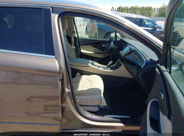 LRBFXBSA1HD161631 2017 BUICK ENVISION Золотой Вид салона спереди