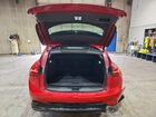 2025 Buick Envision Sport Touring Red vin: LRBFZLE46SD011625