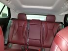 2025 Buick Envision Sport Touring Burgundy vin: LRBFZLE48SD028183