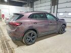 2025 Buick Envision Sport Touring Burgundy vin: LRBFZLE48SD028183