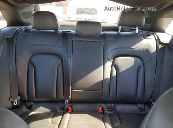 WA1BFCFSXGR011394 2016 AUDI Q3 White Vista de los asientos traseros