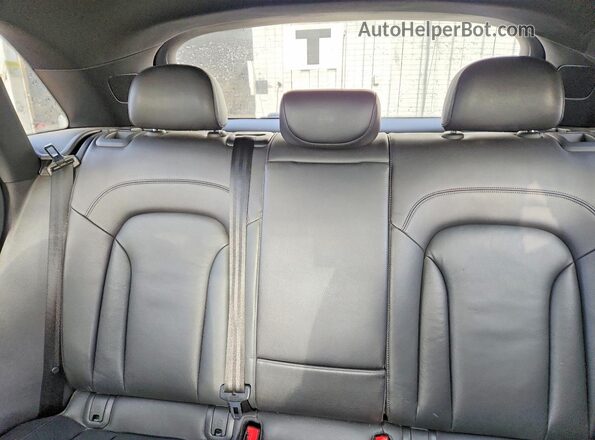 WA1GFCFS9GR024093 2016 AUDI Q3 Black Vista de los asientos traseros
