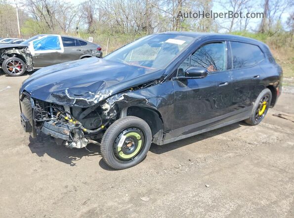 WB523CF02RCP02773 2024 BMW IX Black Vista tres cuartos delantera izquierda
