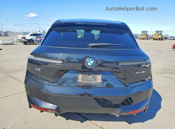 WB523CF02SCS46201 2025 BMW IX Black უკანა ხედი