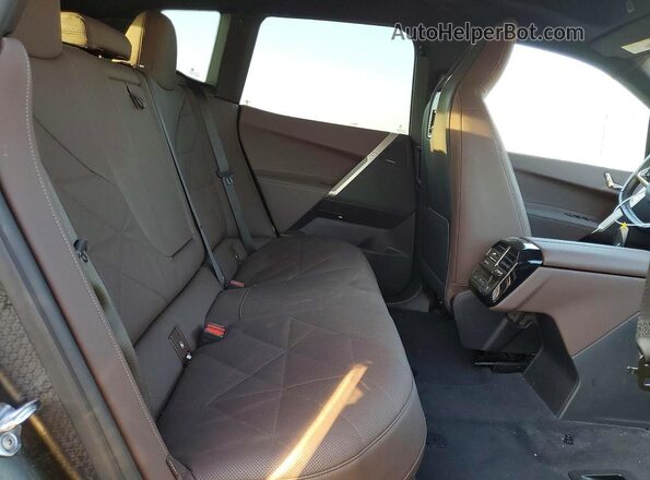 WB523CF04RCN52035 2024 BMW IX Black Vista interior trasera