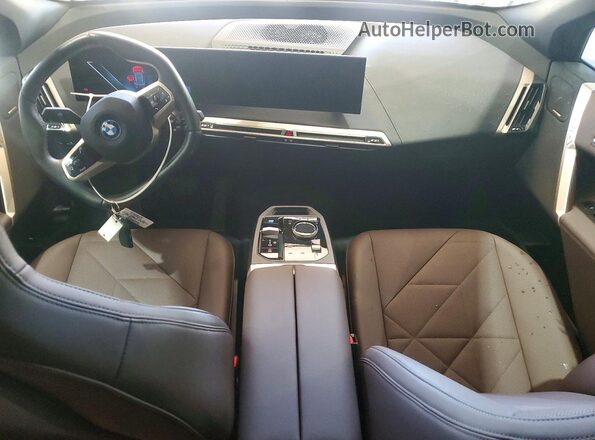 WB523CF06RCP11220 2024 BMW IX Blue Widok deski rozdzielczej