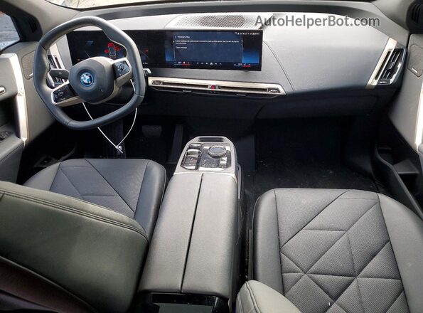 WB523CF07SCS20502 2025 BMW IX Серый Вид панели приборов