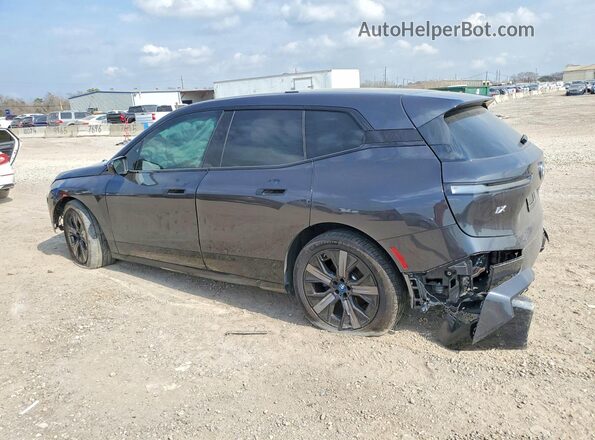 WB523CF08SCS74858 2025 BMW IX Black Trasero izquierdo