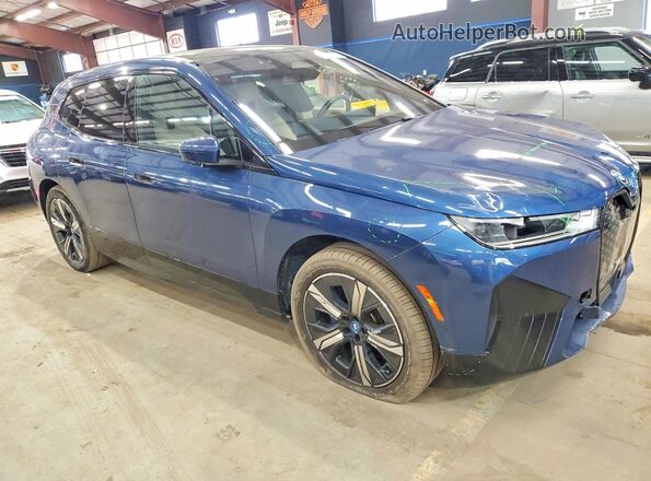 WB523CF08SCU04038 2025 BMW IX Blue Front right