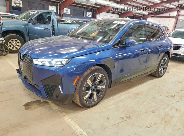WB523CF08SCU04038 2025 BMW IX Blue Front left