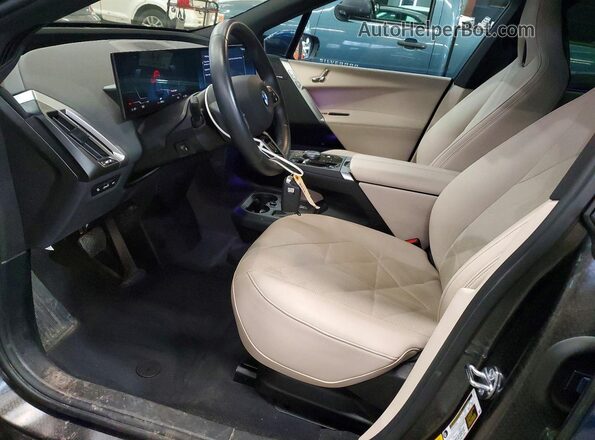 WB523CF08SCU04038 2025 BMW IX Blue Front interior view