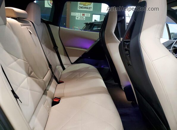 WB523CF08SCU04038 2025 BMW IX Blue Rear interior view
