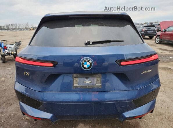WB523CF09PCL20818 2023 BMW IX Blue Widok z tyłu