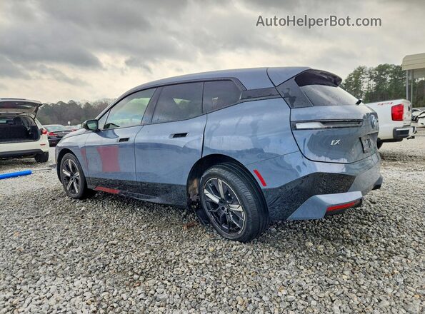 WB523CF09RCN79618 2024 BMW IX Синий Задняя левая четверть