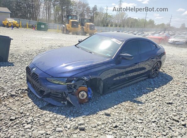 WBA13AW03NFM47089 2022 BMW M4 Blue Vista tres cuartos delantera izquierda