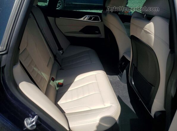 WBA13AW03NFM47089 2022 BMW M4 Blue Vista de los asientos traseros