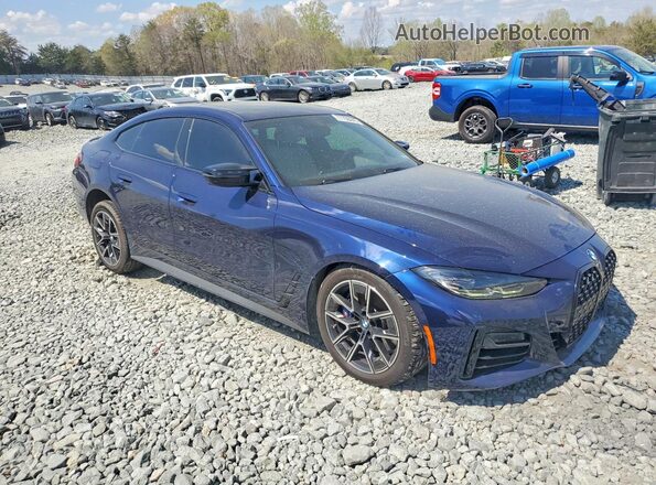 WBA13AW03NFM47089 2022 BMW M4 Blue Delantero derecho