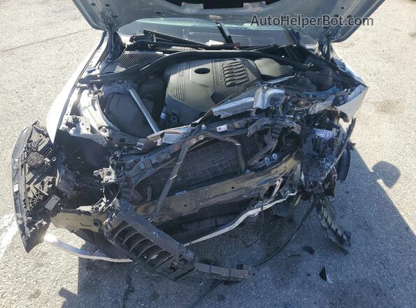 WBA13AW08NFN19548 2022 BMW M4 Silver Widok wnętrza z tyłu