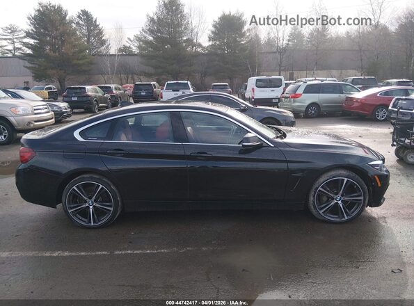 WBA4J7C01LBV99676 2020 BMW OTHER Black Widok wnętrza 360 stopni