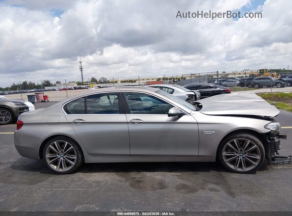 WBA5A5C52GG353622 2016 BMW 5 SERIES Золотой Вид задней части салона